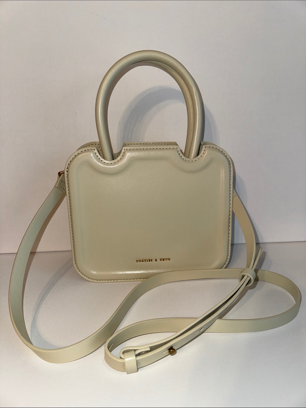 Charles & Keith Perline Sculptural Top Handle Bag